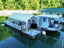 9 x 27 Floating Cabin on 1969 Drift-R-Cruz Fiberglass Hull Houseboat with 2 Attached Dock and a Transferable Mooring Location on Norris Lake TN with Shore Power at Indian River Marina near Jacksboro Tennessee
