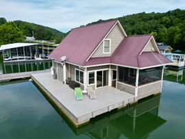 Approx 26 x 36 1,340sqft 2-Story 3 Bed 2 Bath Floating Cabin in a Rental Management Program For Sale on Norris Lake Tennessee at Bos Indian River Marina near Jacksboro Tennessee
